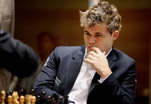 Chennai: Magnus Carlsen of Norway during the sixth match against Viswanathan Anand of India at FIDE World Chess Championship in Chennai on Saturday. PTI Photo R Senthil(PTI11_16_2013_000160A)