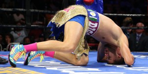 FAIRFAX, VA - OCTOBER 17: Prichard Colon holds the back of his head and falls to the mat after taking a punch from Terrel Williams in their super welterweights bout at EagleBank Arena on the campus of George Mason University on October 17, 2015 in Fairfax, Virginia. (Photo by Patrick Smith/Getty Images)