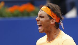 Rafa Nadal reacts as he celebrates his victory over Fabio Fognini of Italy during the Barcelona open tennis tournament in Barcelona, Spain, Friday, April 22, 2016. (AP Photo/Manu Fernandez)