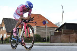 FILE - In this May 5, 2012 file photo, Michele Scarponi of Italy wears the 2011 edition winner's pink jersey during the first stage of the Giro d'Italia cycling race, a 5.4-mile individual time trial, in Herning, Denmark. Scarponi died Saturday, April 22, 2017 after being hit by a van during training in Filottrano, central Italy.  (AP Photo/Daniele Badolato, file)