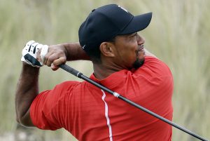 FILE - In this Dec. 4, 2016, file photo, Tiger Woods watches his tee shot on the third hole during the final round at the Hero World Challenge golf tournament in Nassau, Bahamas. Woods said he had fusion surgery on his back because he could no longer tolerate the pain, and that he wants to get back on the PGA Tour.  "I haven't felt this good in years," he said Wednesday, May 24, 2017, in an update on his website.  Woods had the fusion surgery on April, his fourth surgery on his back dating to the spring of 2014 , and said it provided "instant nerve relief." (AP Photo/Lynne Sladky, File)