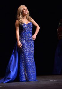 Mikayla Holmgren wears a royal-blue evening gown during the Miss Minnesota USA contest at Ames Center in Burnsville, Nov. 26, 2017. (Pioneer Press / Scott Takushi)